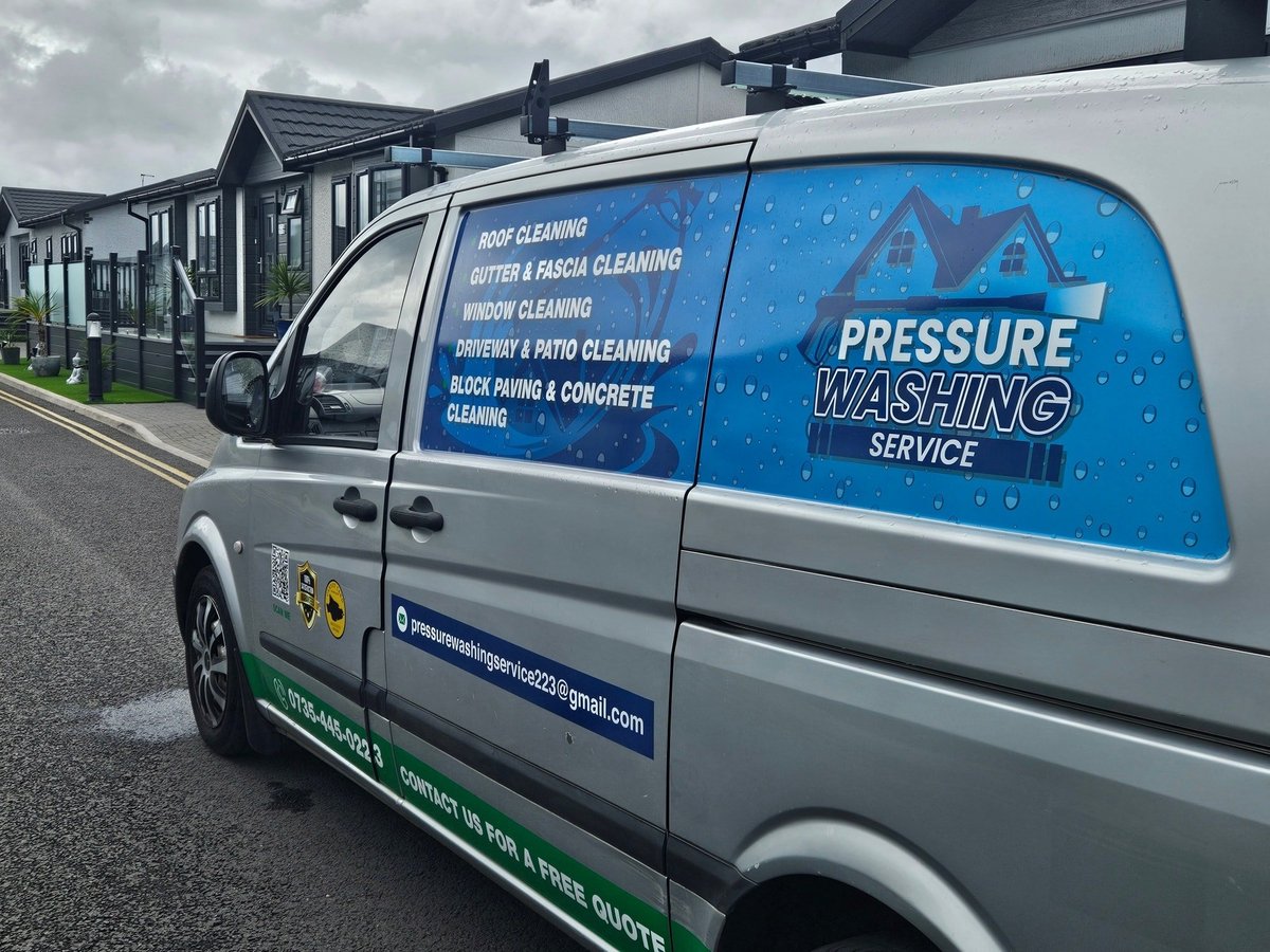 Pressure Washing Services van parked in driveway